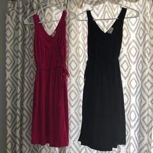 Two maternity dresses - size medium- black & pink